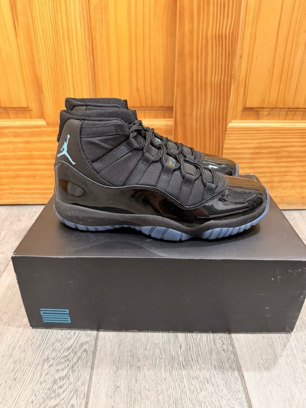 Jordan 11 Retro Black with Blue Jumpman - Picture 2 of 10